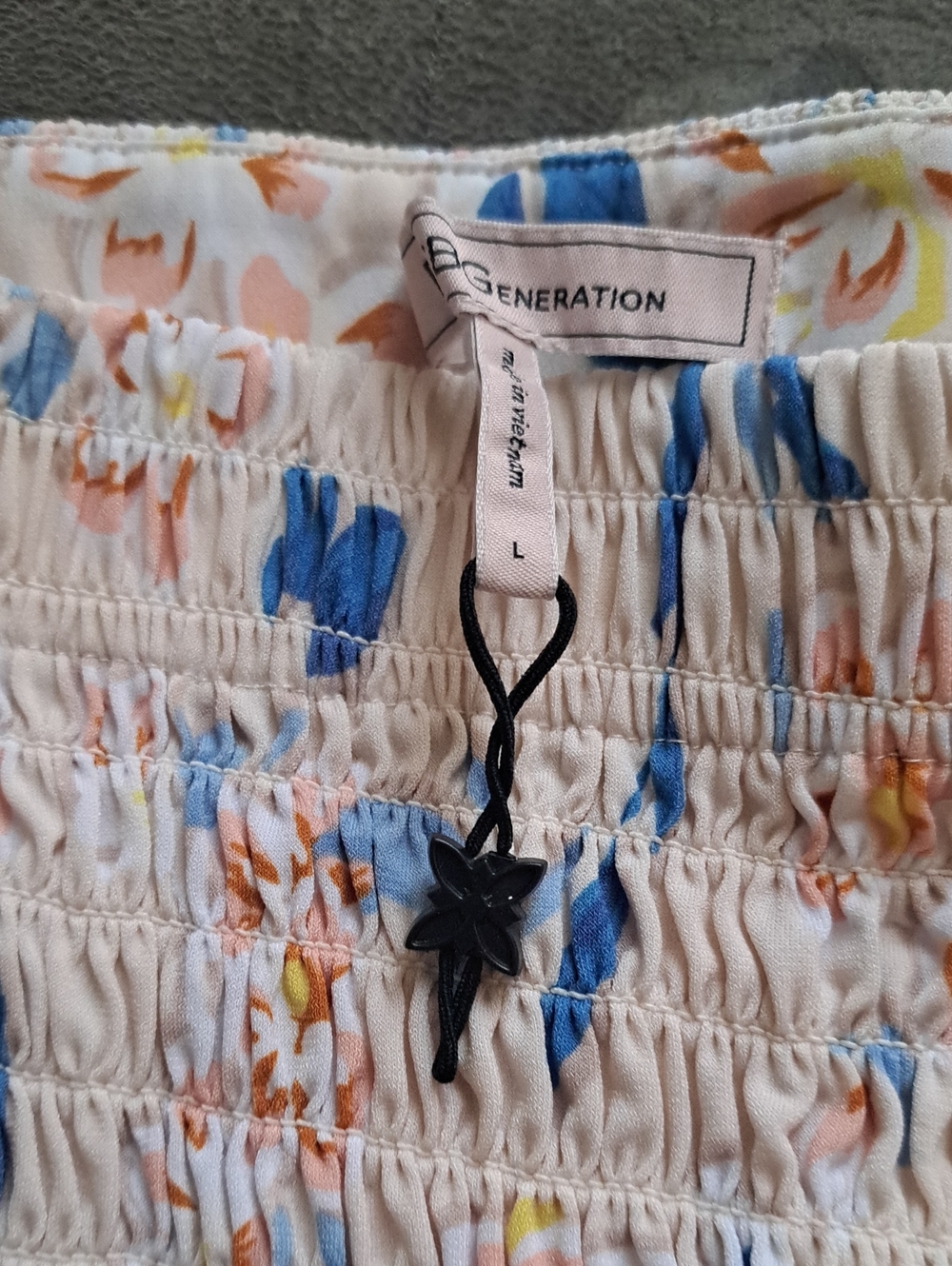 BCBG Cream Floral Smocked Maxi Skirt with Blue and Peach Accents